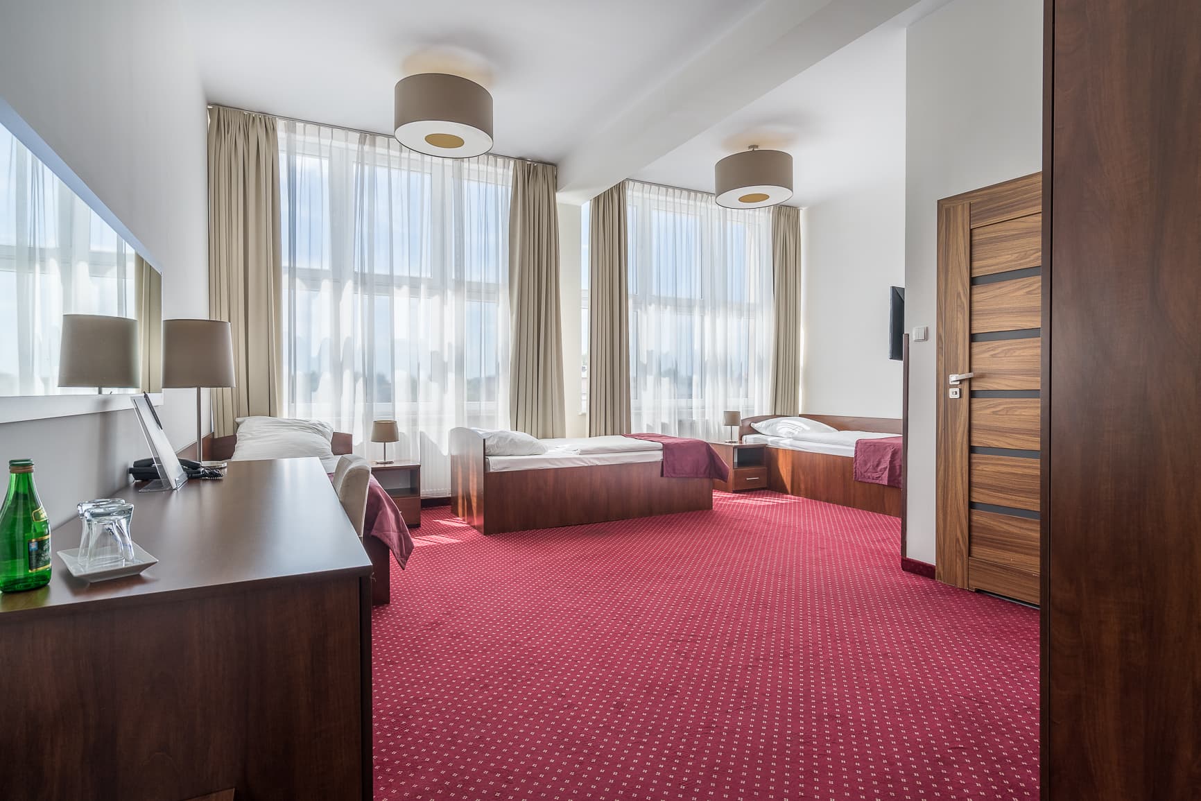 Pokój trzyosobowy z trzema łóżkami w Hotelu Stork